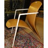 Modernist bent plywood armchair with iron frame