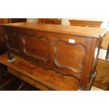 A French panelled oak coffer.