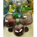 7 coloured glass brandy balloons.