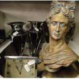 A bust, an urn, clock, etc.