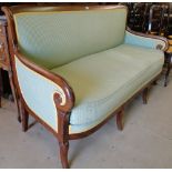 A French Empire style walnut framed sofa, with green & gold upholstery,