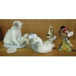 Lladro polar bear and cubs, Lladro duck and ducklings, Szeiler dog and a Beswick Goldfinch.