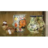 19th century mask jug, Doulton condiments and a pair of vases.