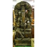 A large carved hardwood figure of Ganesh.