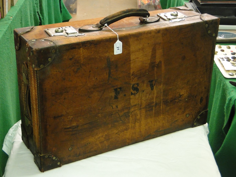 A leather suitcase.