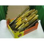 A box of carpenter's chisels.