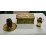 A cast brass casket, candlestick and a 19th century desktop lighter.