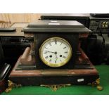 A 2-train slate and marble cased mantel clock.