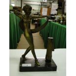 An Art Deco bronze patinated spelter dancing girl table lighter on marble plinth.