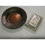 A Hebrew - English prayer book in ornate stone set white metal covers and an engraved copper dish.