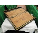 A 19th century brass bound walnut writing slope with plaque dated 1815.