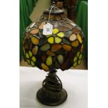 Table lamp with Tiffany style shade.