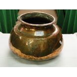 Antique copper pot with engraved decoration.