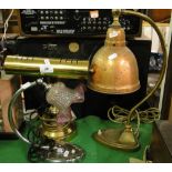 A brass desk lamp, a brass lamp with copper shade and another with glass shade, (3).