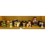 A shelf of various Toby jugs including Shorters and Sylvac.