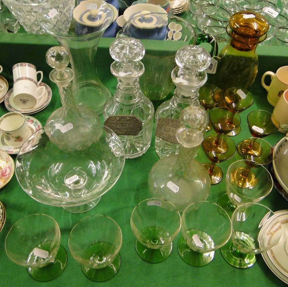 Glass water jug, cut-glass decanters, amber glass liqueur set, etc.