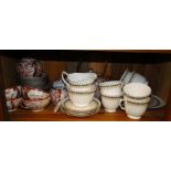 A Japanese eggshell porcelain teaset with lithophane Geisha girl,