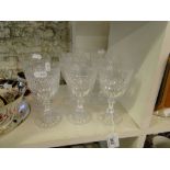 A set of 8 cut-glass goblets.