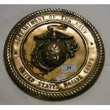 A brass United States Marine Corps. plaque.