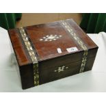 A sewing box with inlaid mother of pearl decoration, fitted interior and contents.