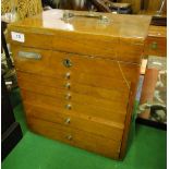 A table top collector's chest of 6 long graduated drawers.