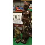 A carved wood semi nude girl, carved wood figure of Don Quixote and another, (3).