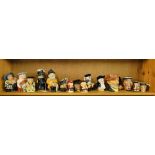 A shelf of Character jugs including Shorter's.