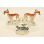 Pair of Victorian Staffordshire greyhounds, circa 1880, decorated in naturalistic colours,