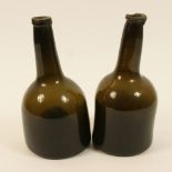 Two 18th Century seal top bottles, each of mallet form, 23.