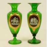 Pair of Victorian green glass cameo vases, circa 1870, ovoid form with trumpet neck and foot,
