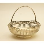 George V silver bonbon basket, Birmingham 1913, circular form with swing handle, pierced border, 14.