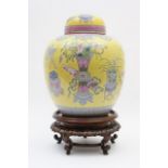 Chinese famille jaune jar and cover, 19th Century, decorated with auspicious objects for marriage,