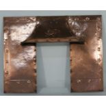 Arts & Crafts period copper fire surround, circa 1905-10, with integral hood,