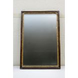 George III walnut and parcel gilt wall mirror,