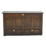 George II oak mule chest, two plank top over four arched fielded panels,