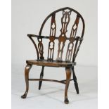 Gothic high back Windsor armchair, in stained beech and fruitwood, with shaped seat,