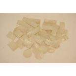 Small quantity of Chinese mother of pearl counters, comprising 39 rectangular, 53mm x 20mm,