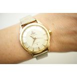Omega Constellation gold plated wristwatch, champagne coloured dial with dagger baton numerals,