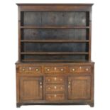 Late George III oak dresser and plate rack, circa 1810,