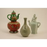 Korean celadon figural teapot, modelled as Guanyin seated amidst clouds, height 20.