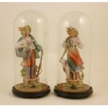Pair of continental coloured bisque figures of hunters, modelled as a boy and girl,