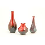 Royal Doulton Sung flambe vase, bottle form, decorated with streaky red and blue glazes,