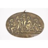 Cast brass plaque, late 19th/early 20th Century, oval form relief cast with Bachannalian cherubs,