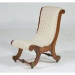 Victorian walnut and upholstered nursing chair, upholstered throughout in an ivory lattice fabric,