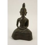 Tibetan bronze Buddha, 17th or 18th Century, cast serenely seated in half lotus pose, height 19.