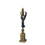 An Oil Lamp,Napoleon III, black and gilt bronze Dim. - 70 cm