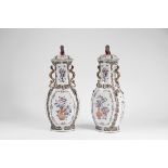 A Pair of Covered Vases,Chinese export porcelain, polychrome and gilt decoration en relief "