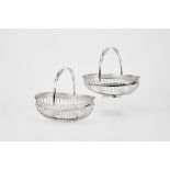 A Pair of Bread Baskets,833/1000 silver and 833/1000 silver thread Dim. - 26,5 x 31,5 x 25,5 cm;