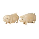 Pigs,a pair of ivory carvings Dim. - 6,5 cm; Peso - 97,89 g.