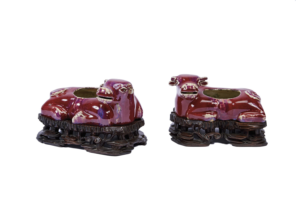 A Pair of Flowerpots "Buffalos",Chinese porcelain sculptures, "Ox-blood" decoration, carved exotic